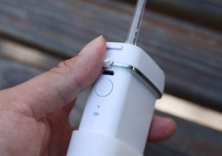 冲牙器可以把牙结石冲下来吗 冲牙器用什么水冲洗好